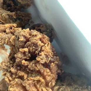 fried chicken in a white container
