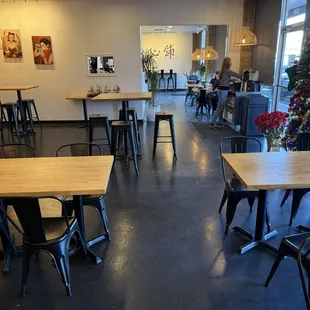 View towards front/entry from the back dining area; water station on right. 12/2024