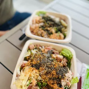 two take out containers of food