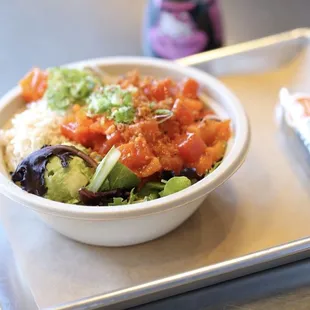 a bowl of food on a tray