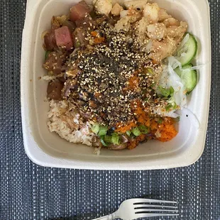 Large Poke Bowl- brown rice + almost all the toppings, signature salmon and tuna + 50cent add on masago