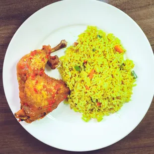 Go Go Fried rice with chickem. Medley of Rice, veggies stewed together into delightful delicacy