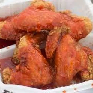 chicken wings in a paper bag