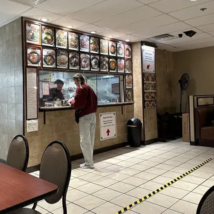 a woman ordering food