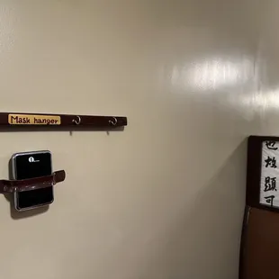 a phone mounted to a wall