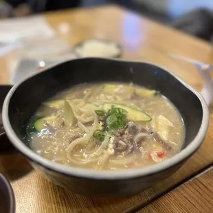 a bowl of soup on a table