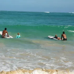 Each girl had a personal coach to help navigate the waves.