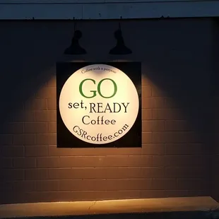 a sign for go set ready coffee