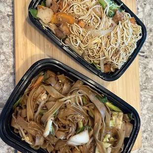 Egg noodles w fried tofu and veggies on top and drunken noodles below.