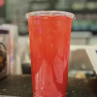 a drink in a plastic cup