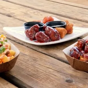 Loaded Kimchi fries, Wingz, and BBQ Burger mac