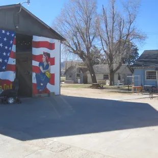 Outside from parking lot, showing barn and back entry door