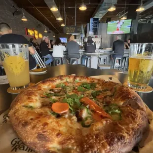 BELLY OF THE BEAST-SAMBAL CREAM. PORK BELLY. GREEN ONIONS. JALAPENOS PICKLED CARROTS. CILANTRO. SWEET CHILI SAUCE * From the rotating menu