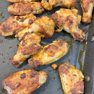 a tray of chicken wings