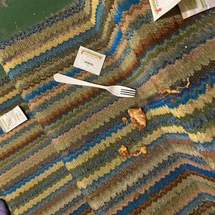 Lasagna package leaked oil ripped and fell all over stairs