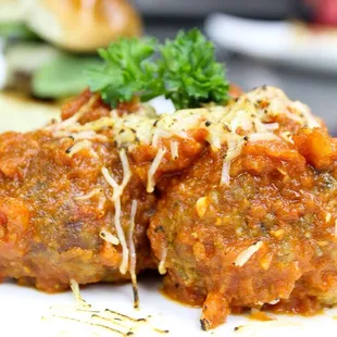 G.O.A.T meatballs. Freshly ground in house pork belly and beef chuck topped with house made marinara.