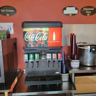 Self-serve soda and water dispenser