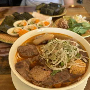 a bowl of soup with meat and vegetables