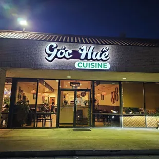 outside of a restaurant at night