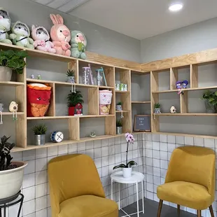 two yellow chairs in a room