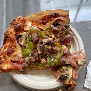 two slices of pizza on a plate