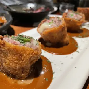 Gyuu Maki (panko crusted beef rolls with asparagus, cheese &amp; hatcho)