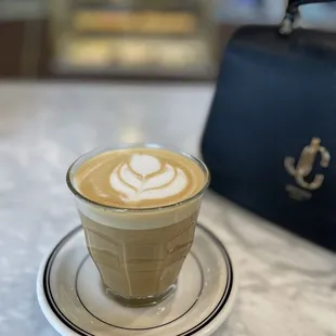 a cup of coffee on a saucer