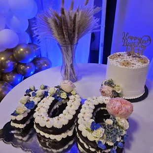 100 cake with real flowers. Chocolate.