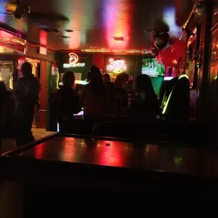 a bar with neon lights