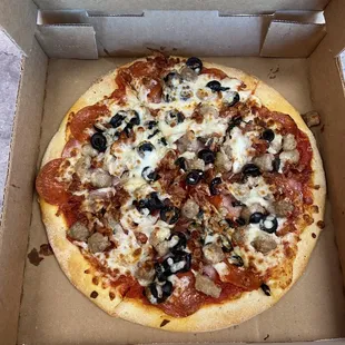 Medium Meat pizza with black olives