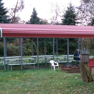 a picnic area with tables and benches