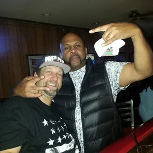 two men posing for a picture