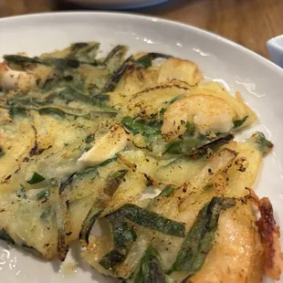 Seafood Pancake - $18.95  Highly recommend getting this app! It has a ton of seafood in it (shrimp, squid) and they sure don't skimp!