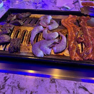 Spicy pork belly, shrimp and top bladed steak