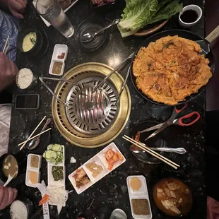 a group of people sitting around a table
