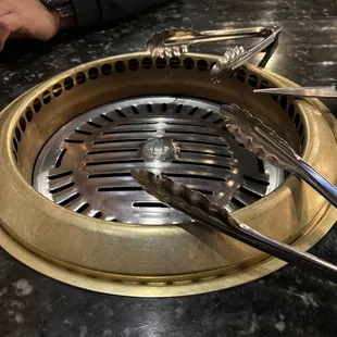 The grill was spotless in the beginning and she even switched it out when it got too black from marinades