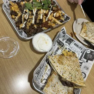 Meat lovers fries and k-steak quesadilla