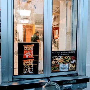 a man looking out a window