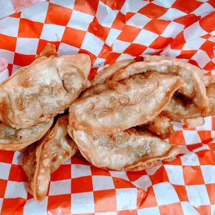 a basket of gogi dumplings