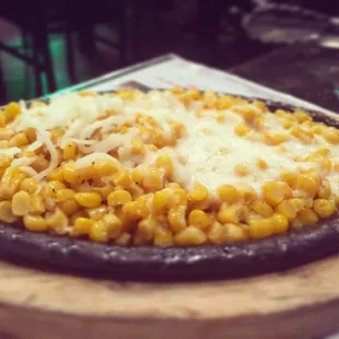 Corn with cheese.