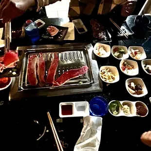 Our table lacked some SERIOUS lighting. A few times we had to turn on our phone's to see if our meat was cooked correctly.