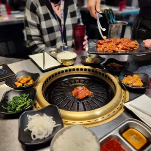 a group of people preparing food