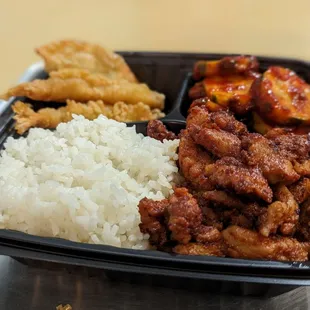 Spicy chicken plate with cucumber kimchi and shrimp