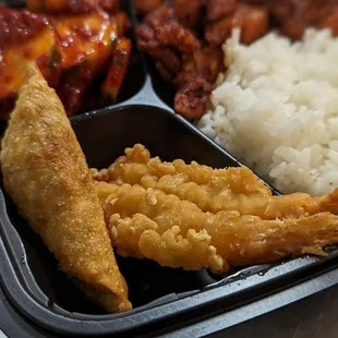 Spicy chicken plate with cucumber kimchi and shrimp