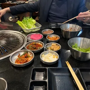 a man preparing a meal in a restaurant