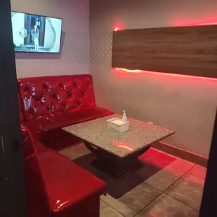 a red couch and table