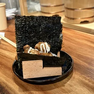 Karaage handroll. Tender chicken bits with mayo cradled in crispy nori atop perfectly cooked rice. Oishii!