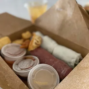 a variety of food items in a box