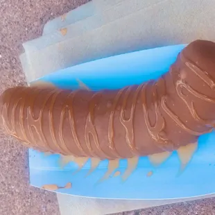 a chocolate covered banana on a stick