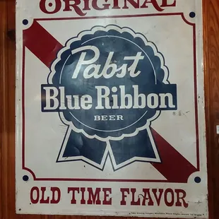 an old time flavor sign